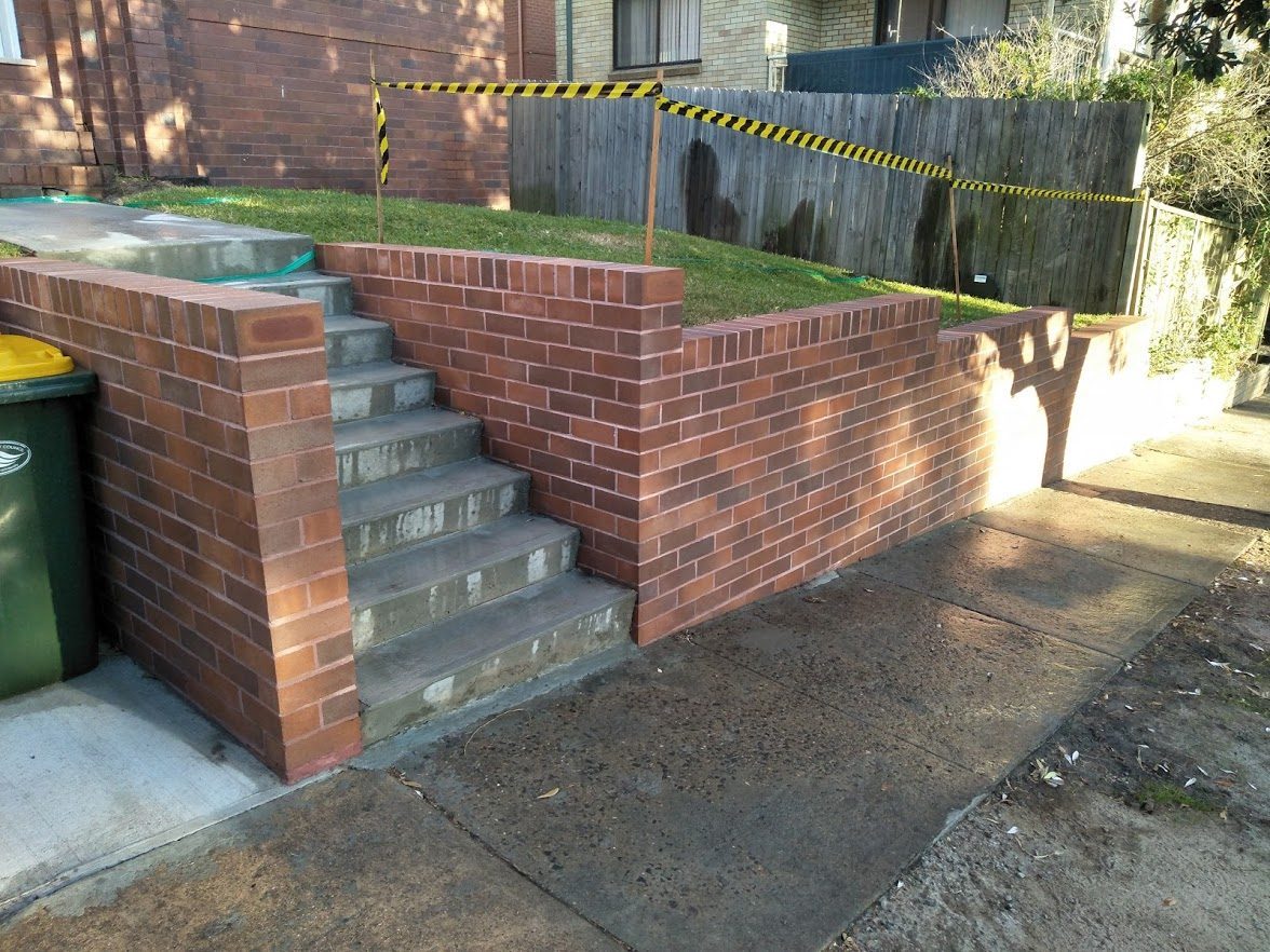 Retaining wall with brick fence and entry steps in Maroubra, Sydney